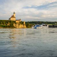 Barge crossing by Schonbuhel Castle on the Danube river