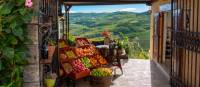 A fruit and vegetable stand with a view in Motovun