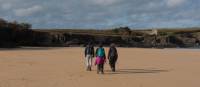 A group walks the South West Coast Path