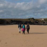 A group walks the South West Coast Path