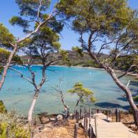 Enjoying secluded swims on a beach in Porquerolles island along the French Riviera
