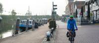 Cycling by the canal in Willemstad