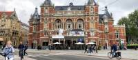 Cycling by the International Theatre in Amsterdam | Mariah Zade