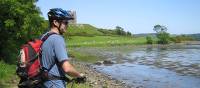 Cyclist by a lake in Northern Ireland