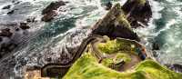 Walking to the edge of the spectacular Dingle Peninsula in Ireland. | Christian Birkholz