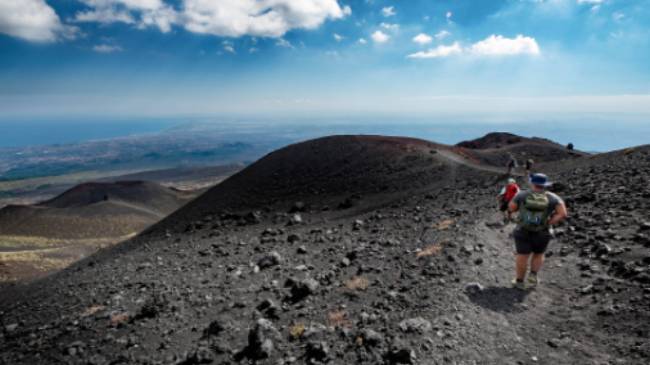 Hiking on Mount Etna volcano in Italy