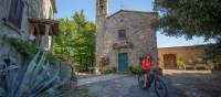 Cycle through pretty villages in Tuscany