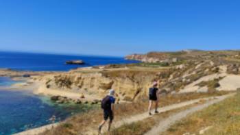 Hikers on coast route from Xlendi to Mgarr