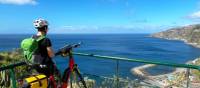 Cyclist taking in the view in Madeira