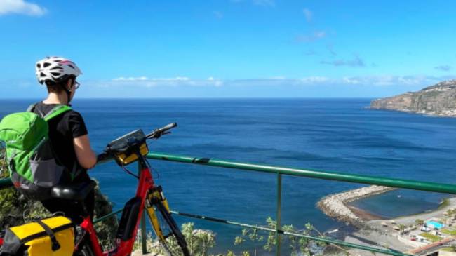 Cyclist taking in the view in Madeira