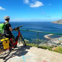 Cyclist taking in the view in Madeira