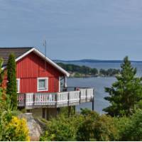 A typical red wooden house in Dalarö, Sweden