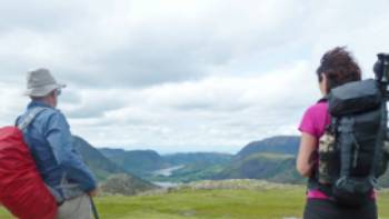 A couple of hikers take in scenes on England's beautiful Lake District | John Millen