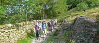 A small group of hikers in England | John Millen