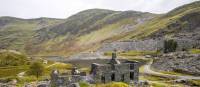 Llyn Cwmorthin with the ruin of Cwmorthin Terrace, the Compressor House and the quarry in the background. | Mareks Perkons