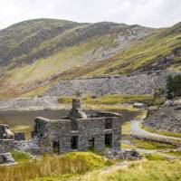 Llyn Cwmorthin with the ruin of Cwmorthin Terrace, the Compressor House and the quarry in the background. | Mareks Perkons