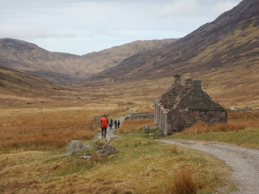 Other walkers and another old farmhouse (Tigh-na-sleubhaich) on the old military road in the glen, surrounded by mountains, between Kinlochleven and Fort William (Day 8). |  <i>Peter Wells</i>