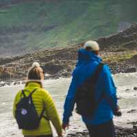 Beach hikers on the Causeway Coast | Caspar Diederik