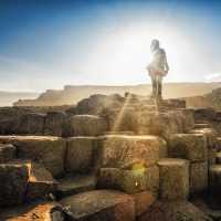 Giants Causeway Hiker in the Sunlight | Caspar Diederik