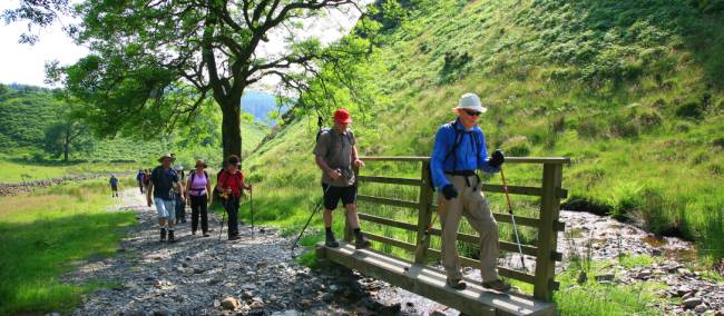 Our group crosses a stream on Wainwright's Coast to Coast walk | John Millen